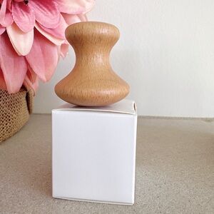 New Origins wood eye massage tool